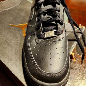 Youths Black air force one's.